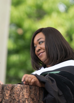 Shonda Rhimes speaking at the podium