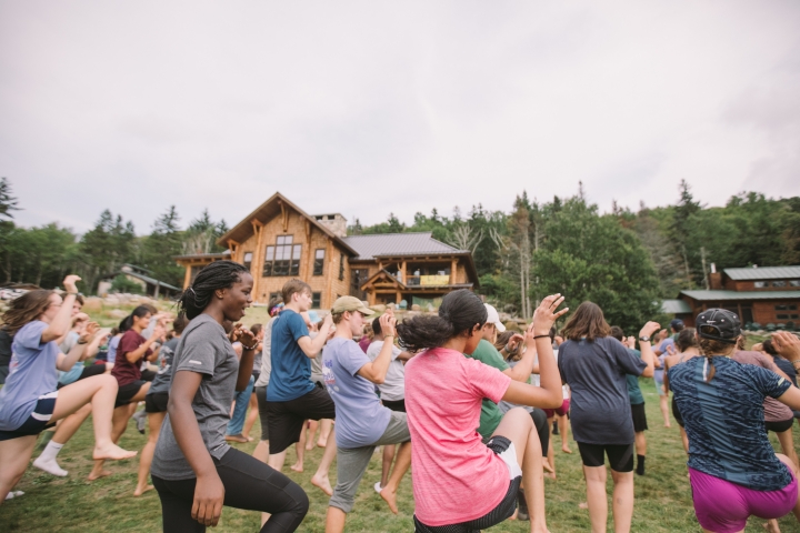 Students dancing outside Moosilauke Ravine Lodge