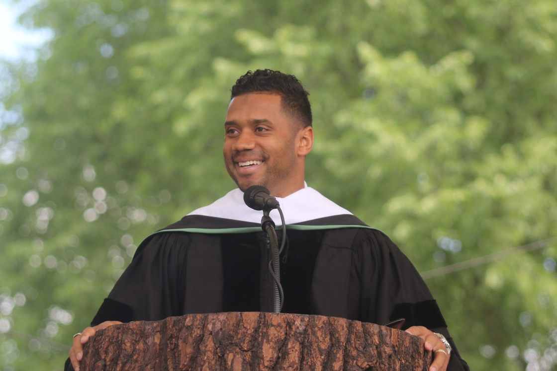 Russell Wilson speaking at Commencement 2022