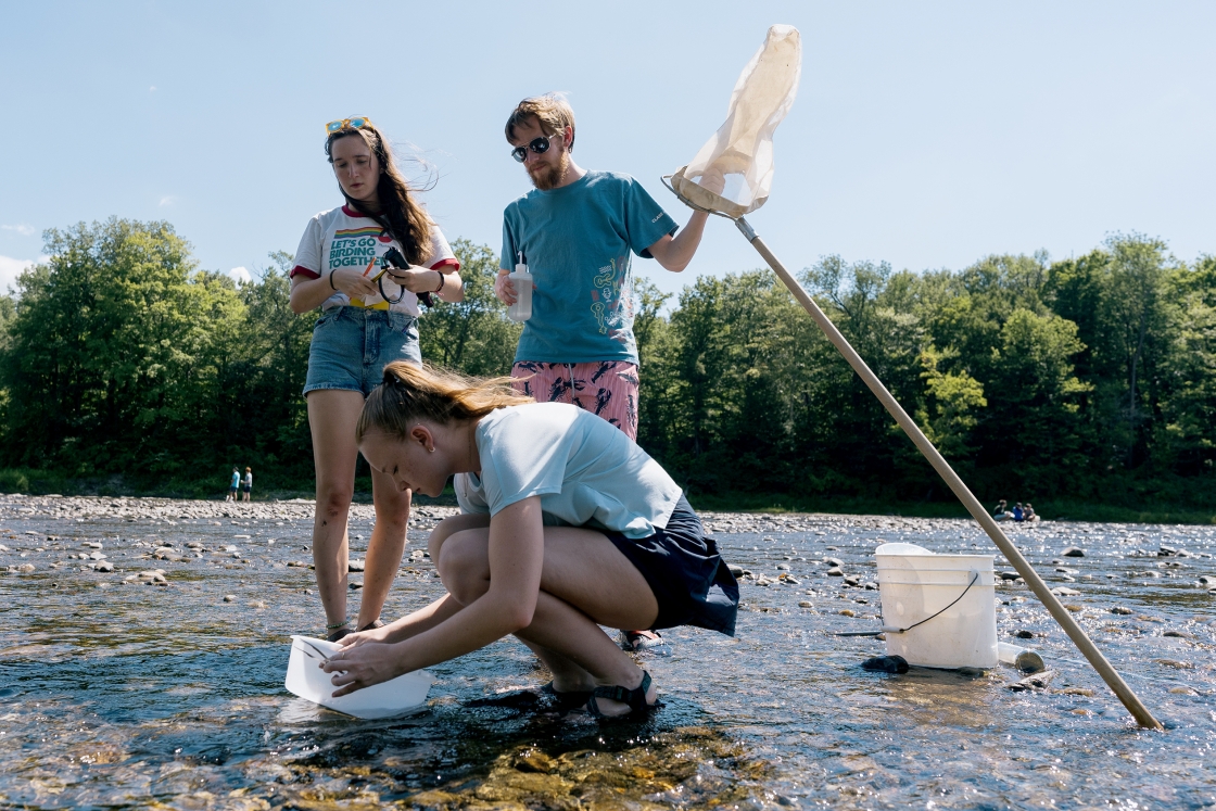 Students participants in the &quot;Methods in Ecology&quot; lab wading into the White River to sample different kinds of stream habitats for benthic macroinvertebrates