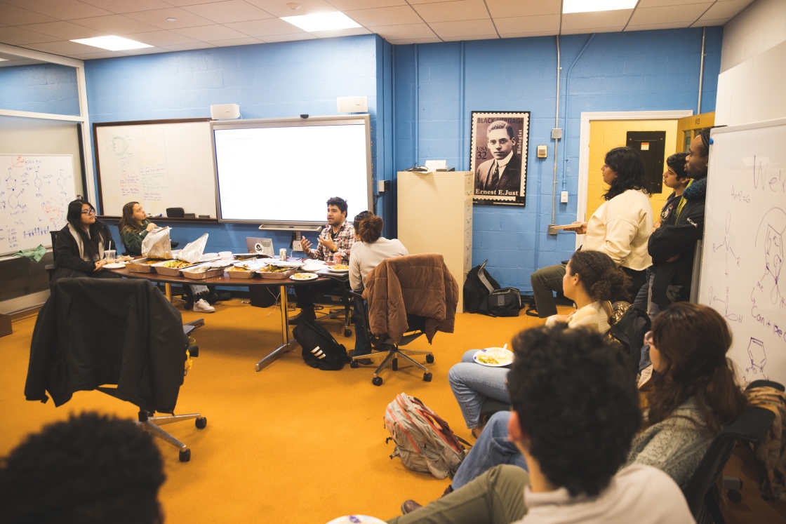 Students listen as graduate fellows give presentations on resume writing.