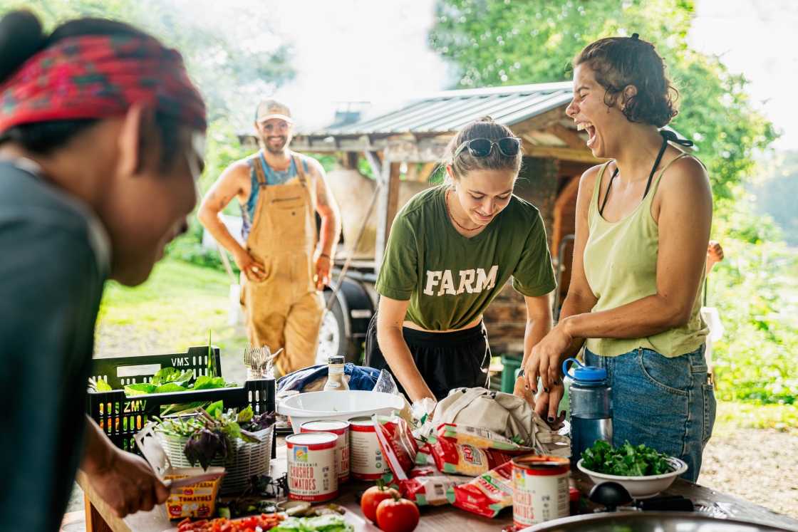 Students build their own pizzas at the Organic Farm