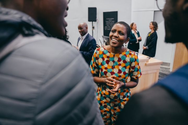 Rose Mutiso talks with attendees