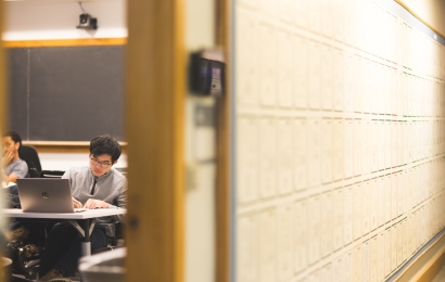 Student in class at laptop