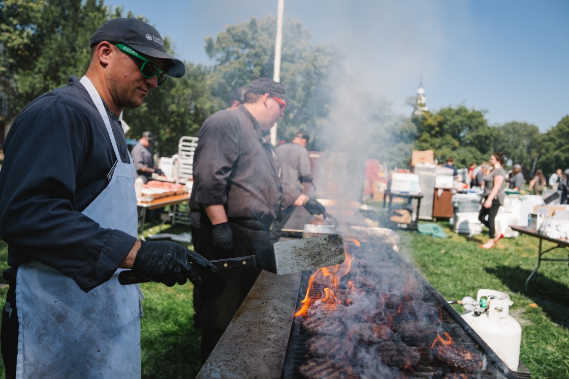 People grilling burgers