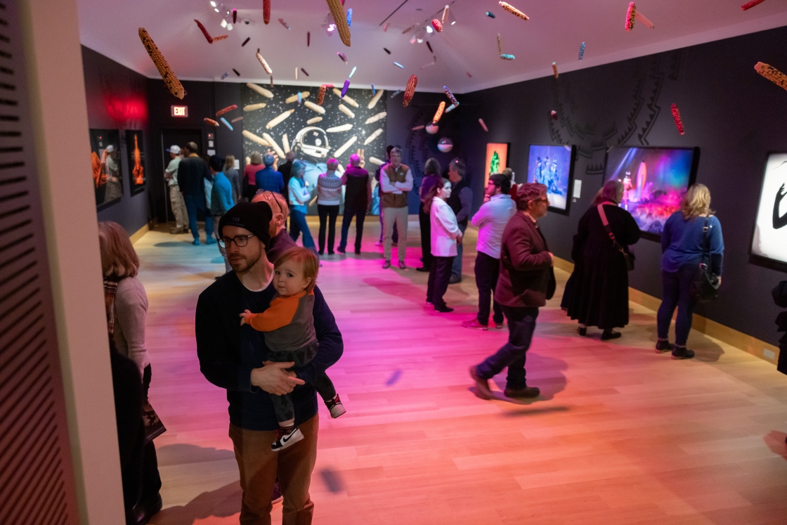 Visitors walking through the gallery, Ancestral Futures