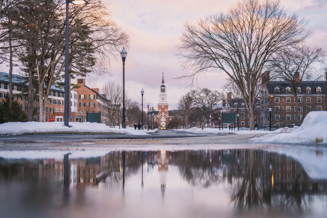 Tuck Mall sunset reflected in a large puddle