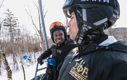 Michael Bongo and Aaryan Agrawal talking on a ski lift