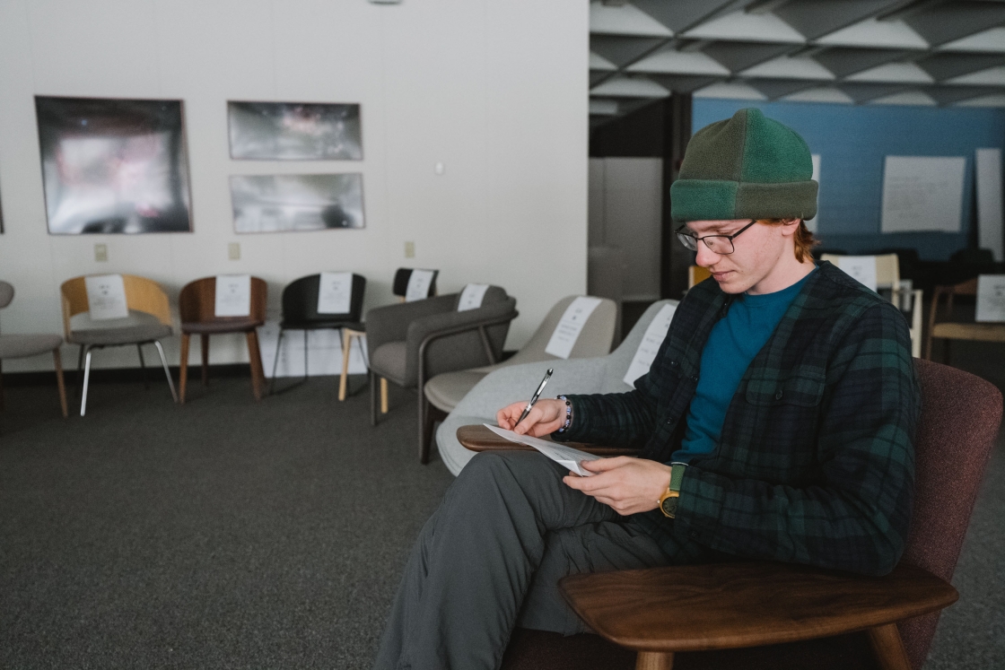 Ashton Lewis sitting in a chair