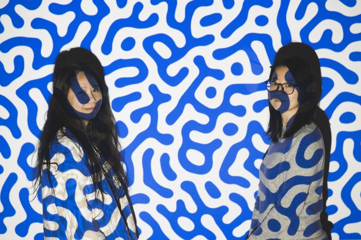 Theresa Ong and Chenyang Su overlayed with project of blue and white patten