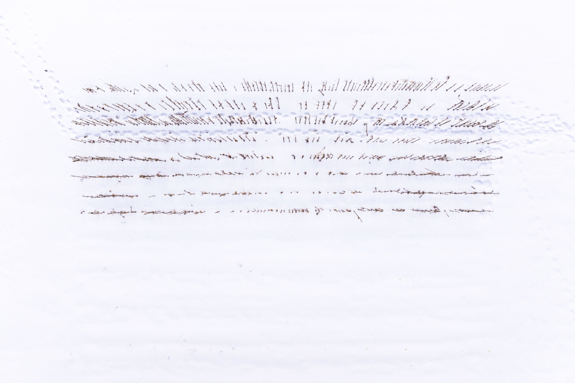 Aerial of snow covered farming field