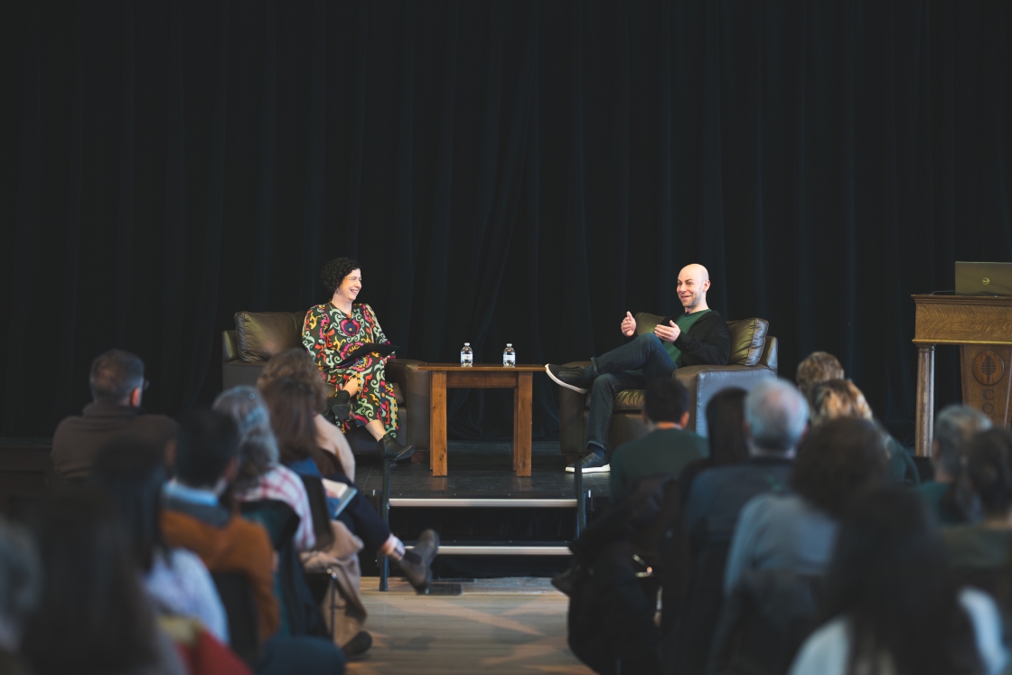 Adam Grant with talk moderator Kristi Clemens