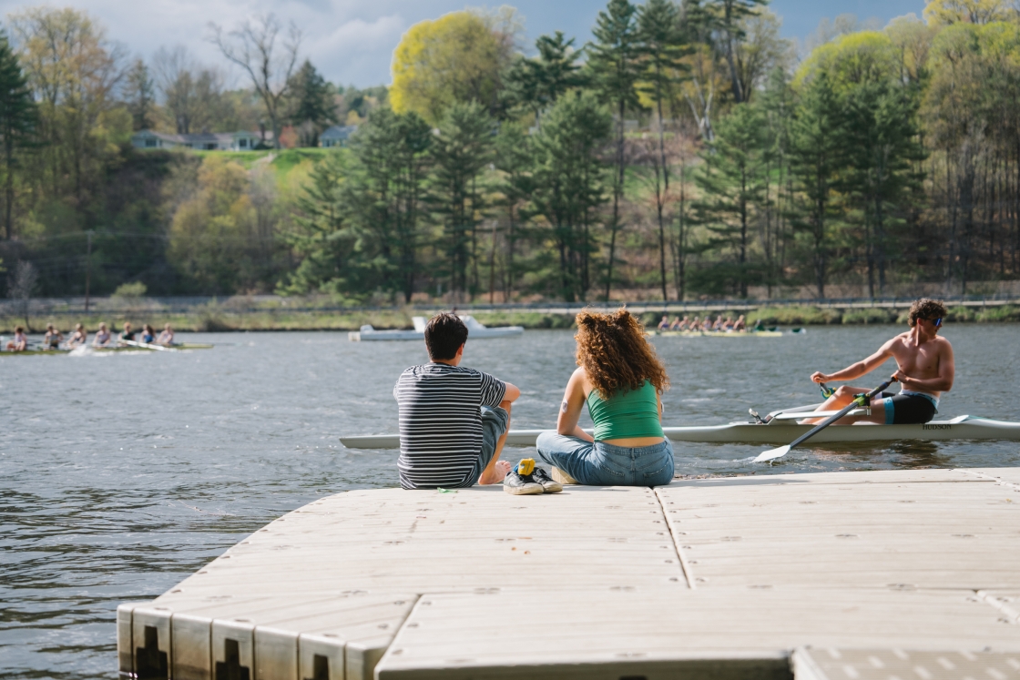 Alex Duffield '27 and Victória Cosmo '28 on a dock