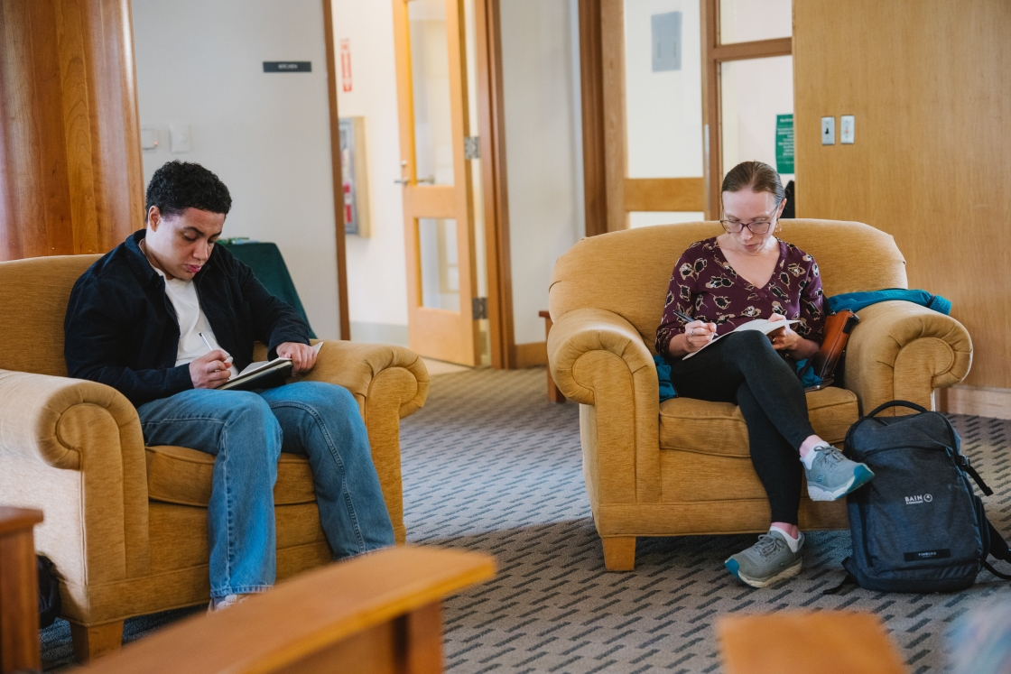 Pascal Phillips-Gallucci and Larissa Pyer journaling