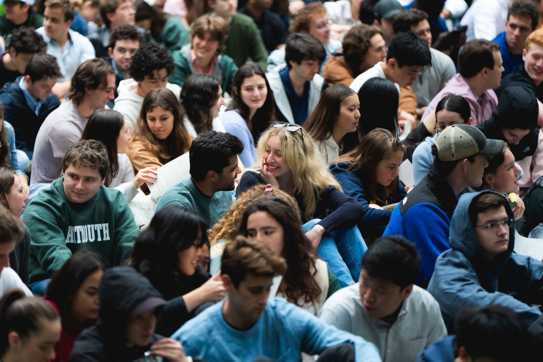 Students sit together at Class Day