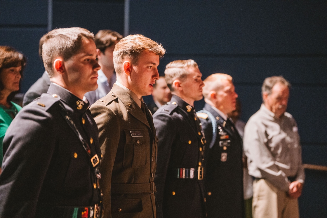 Students singing military anthems