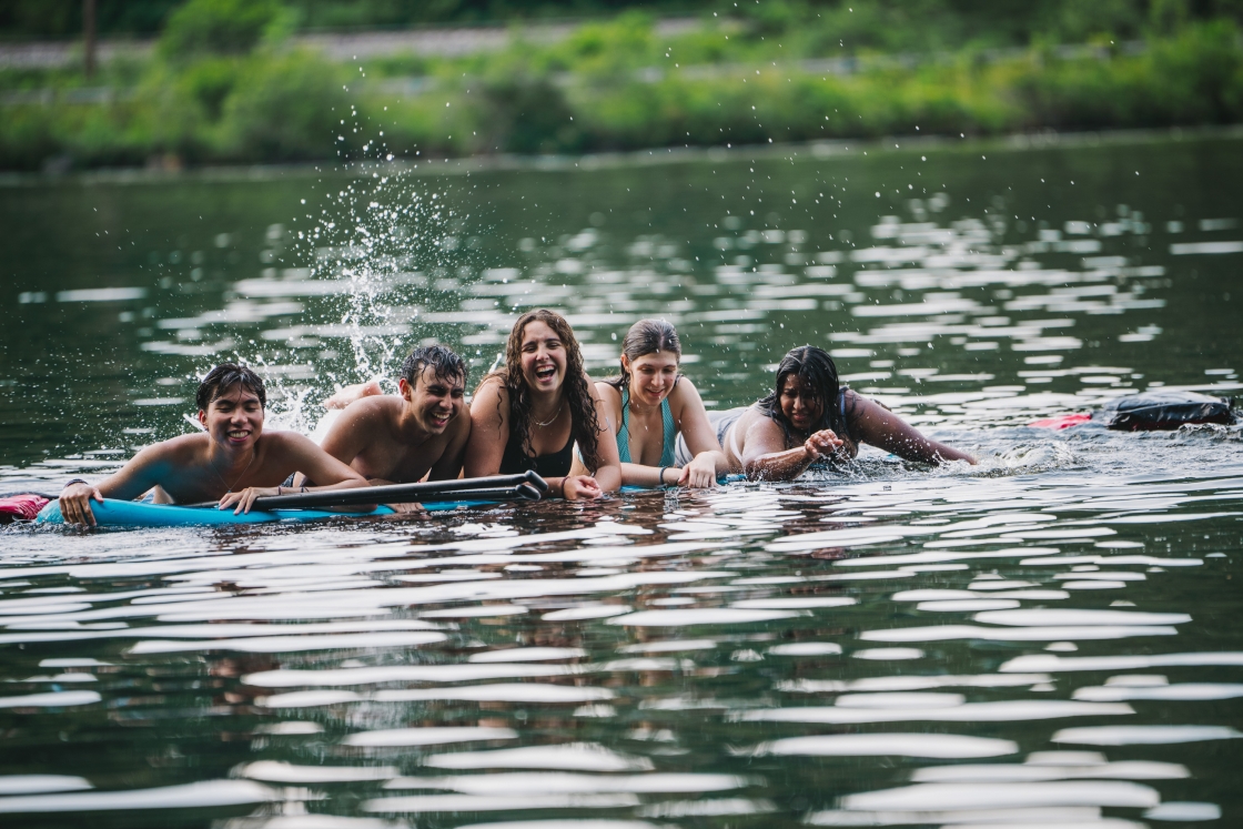 Students paddleboarding