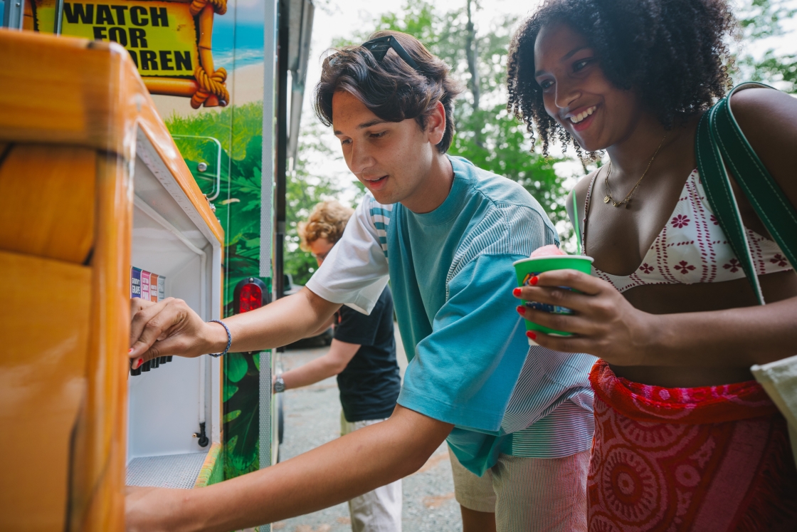 Manu Gupta and Isabel Toma getting shaved ice