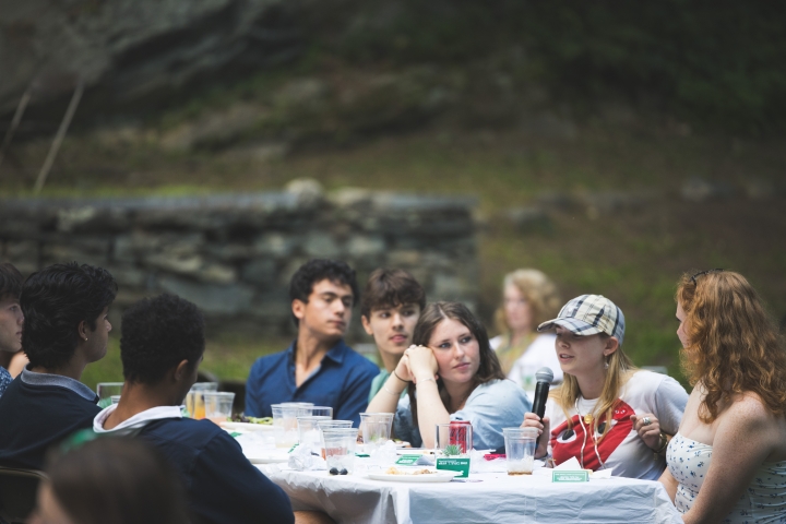 Alice Lloyd speaking into a microphone
