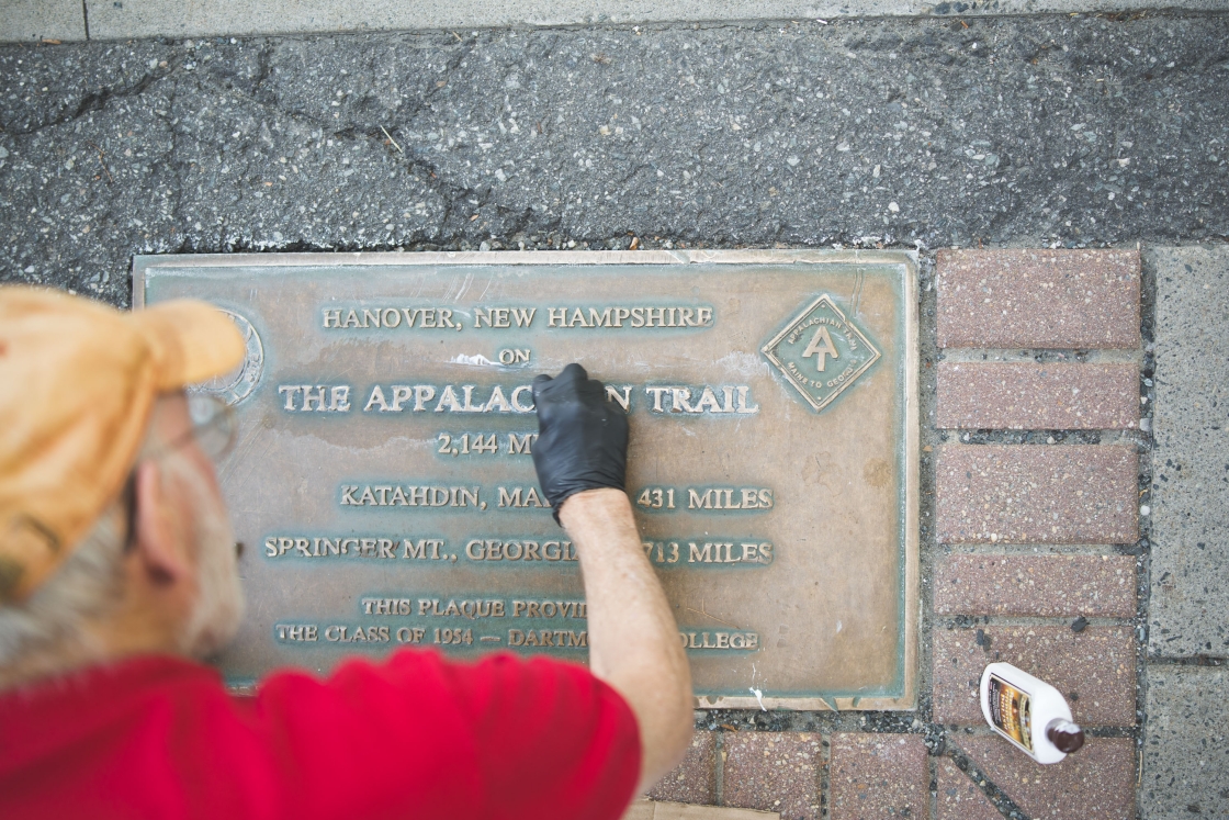 Bill Young polish the AT plaque