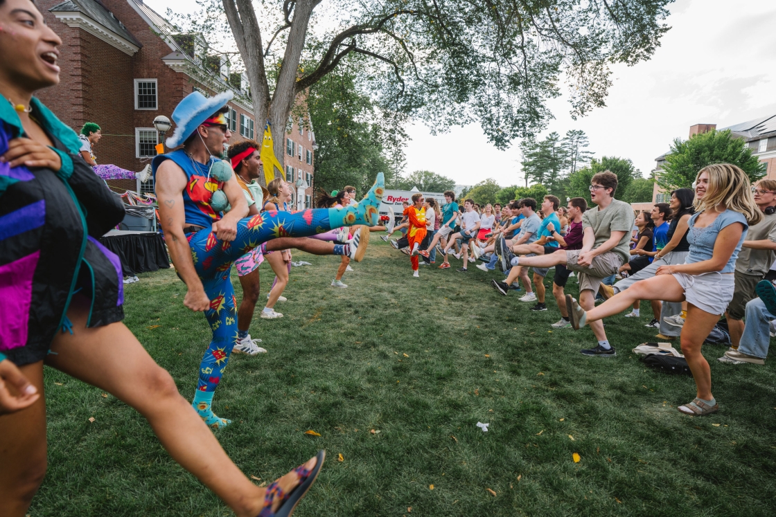 Students dance in flamboyant outfits