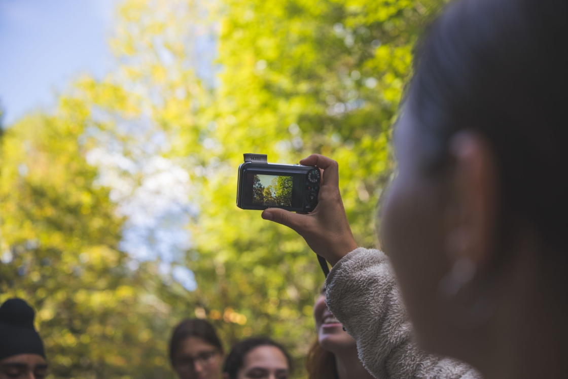 Person holding a camera