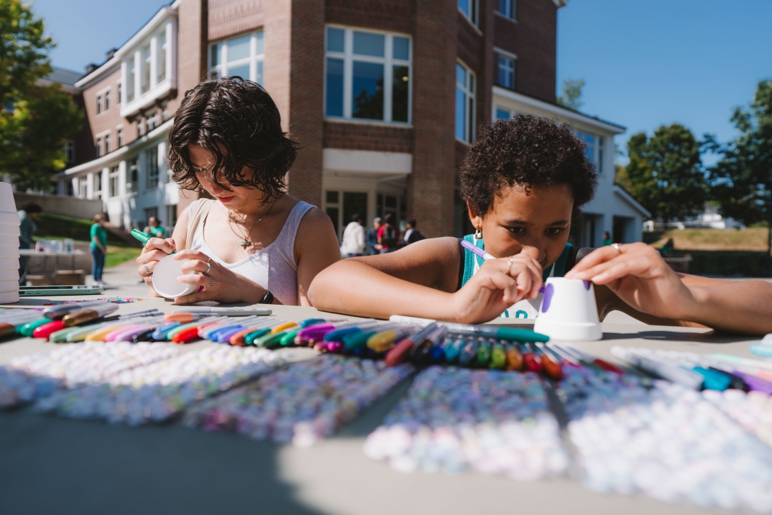 Students decorate mini pots
