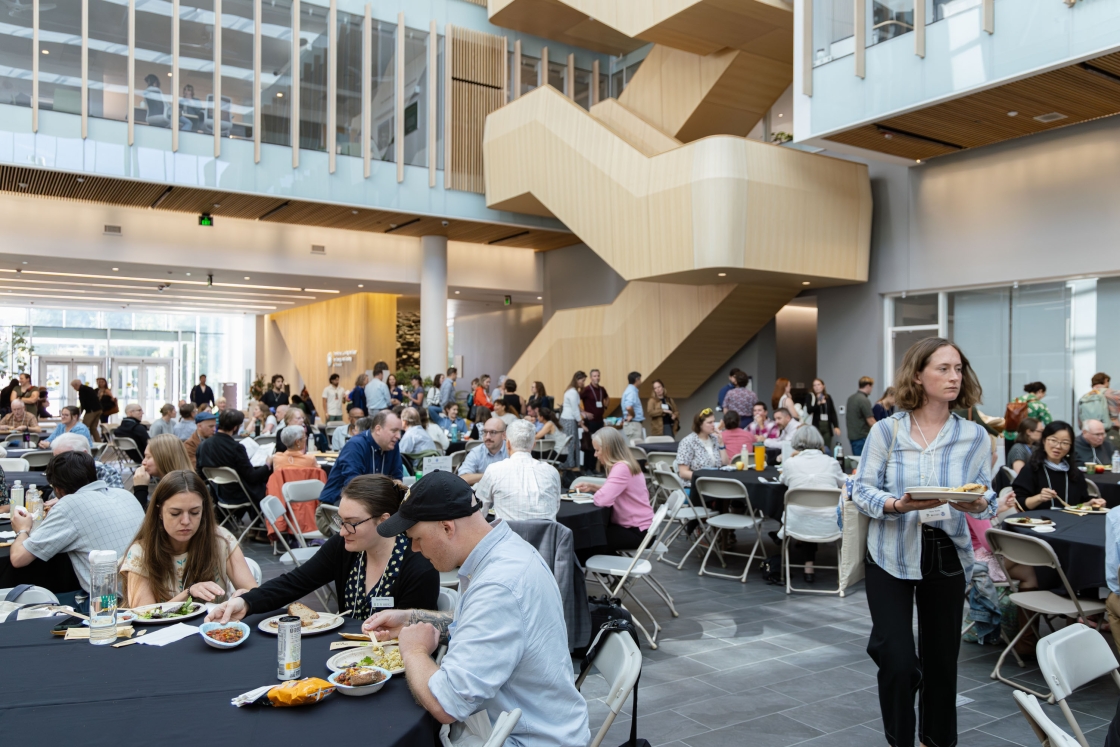 People sitting at tables in the Irving atrium