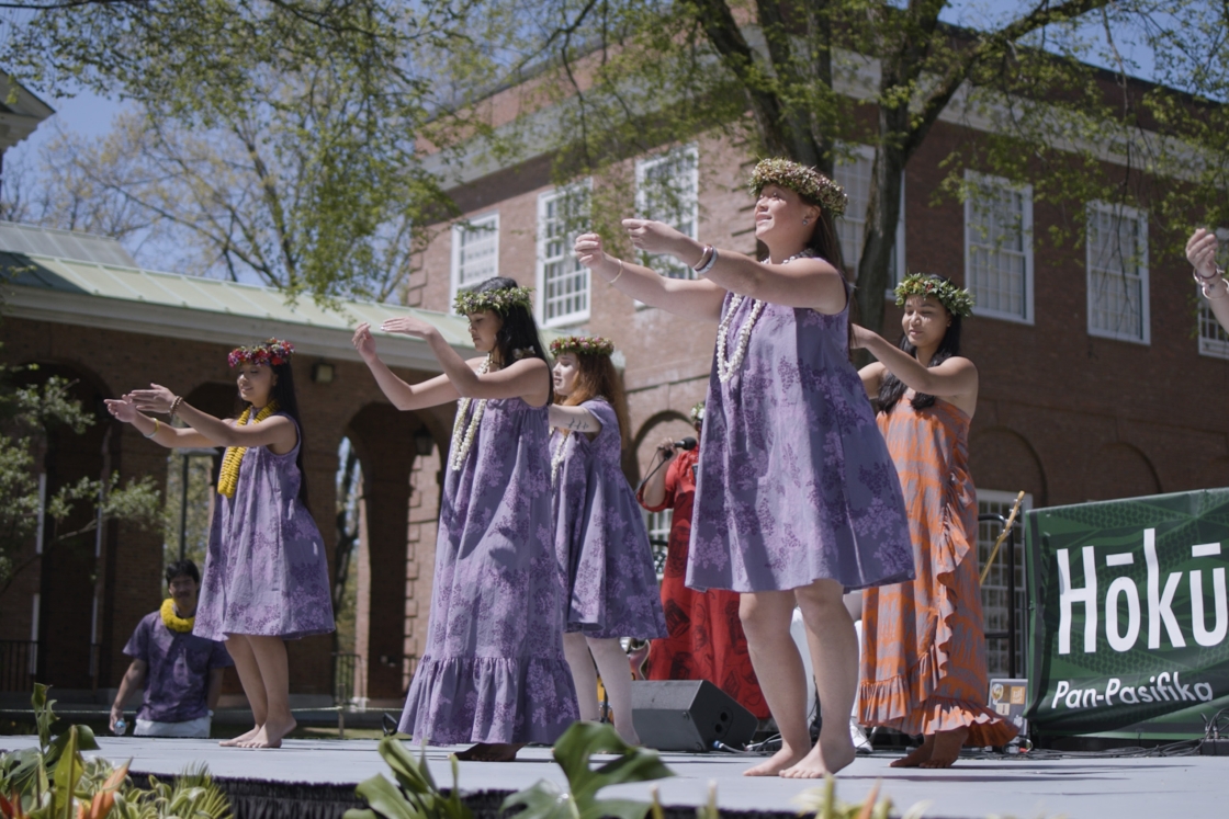 Students dancing in Lu'au attire