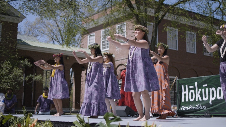 Students dancing in Lu'au attire