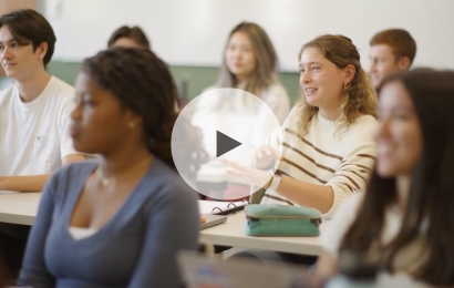 Student discusses topic in classroom