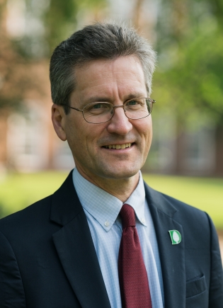David Kotz '86 in a blue jacket and red tie