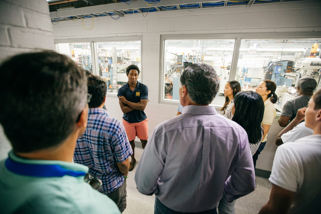 Thayer student giving tour of Machine Shop