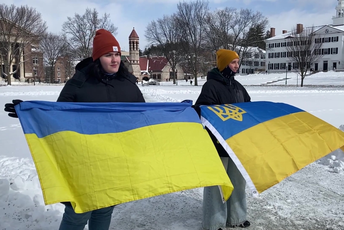 Ukrainian students holding flags on the Dartmouth Green