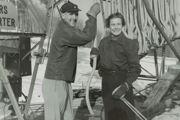 Polly Case posing with the Poma lift and Howard Chivers