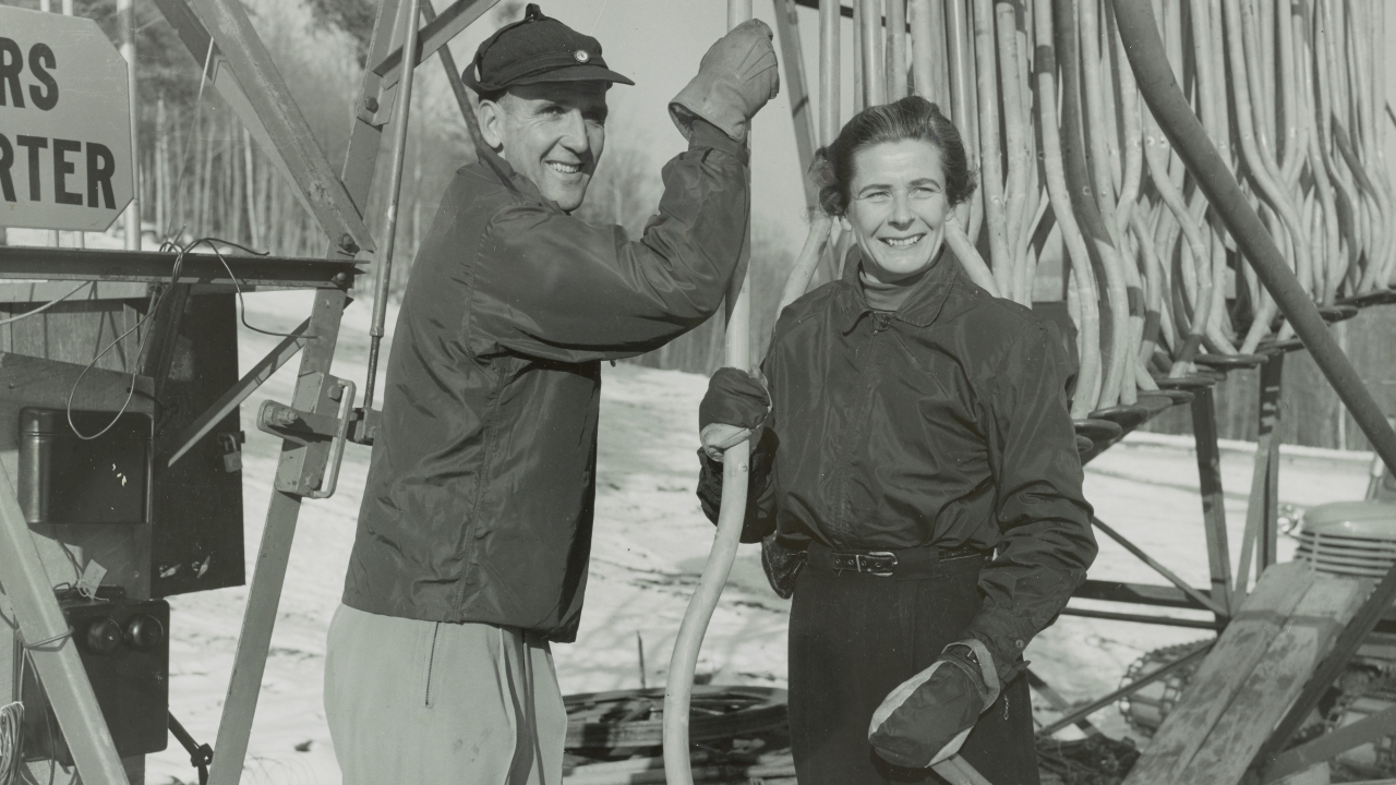 Polly Case posing with the Poma lift and Howard Chivers