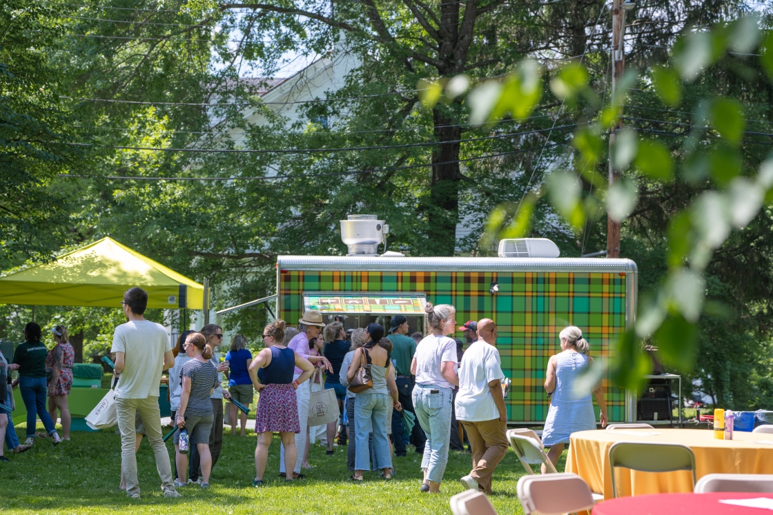 Trailbreak Tacos truck with people gathered around