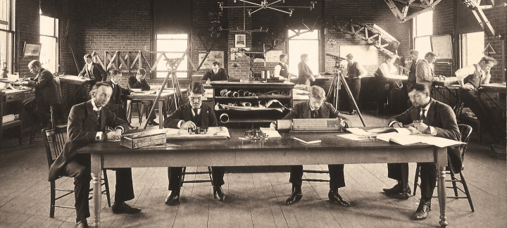 People working around a large table